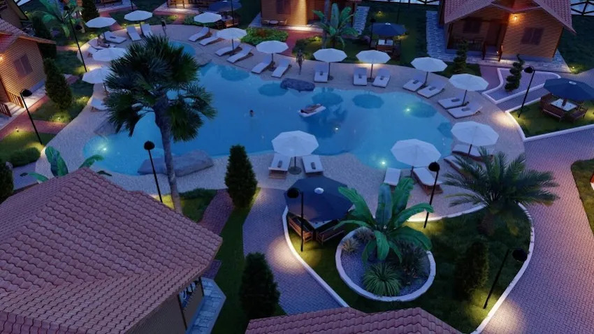 Evening view of tropical resort pool with palm trees and pathway lights